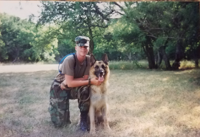 A woman and her dog in the field